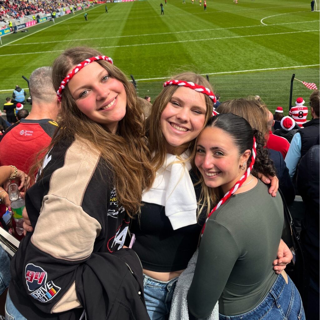 three-students-in-sports-arena